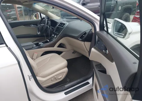 2019 Lincoln Nautilus Reserve z USA, uszkodzony, nr VIN 2LMPJ6L93KBL16213